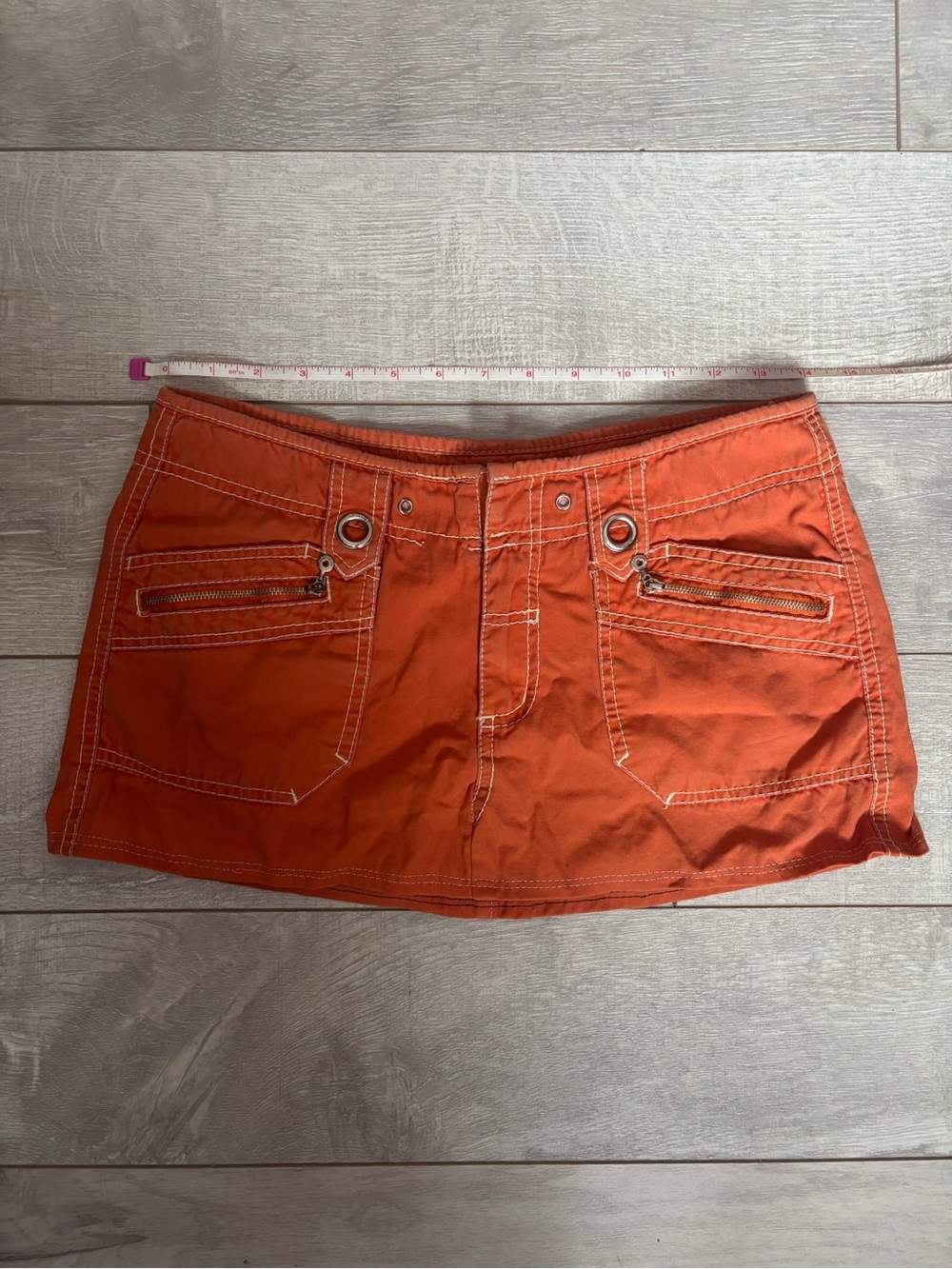 Point Zero Orange Mini Skirt with Zip Pocket Details